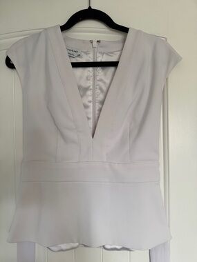 bebe White deep V- Neck top size M NWOT